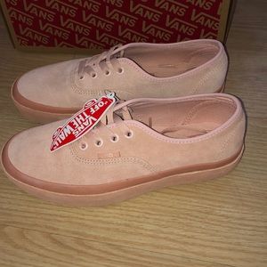Vans, pink and brand new size 8.0 woman 6.5 men.